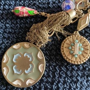 Anthropologie beautiful long necklace with charms.